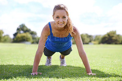 Buy stock photo Women, face and push ups on grass for fitness with exercise, training and workout on sports field. Athlete, person and confidence on ground with physical activity for healthy body or wellness outdoor