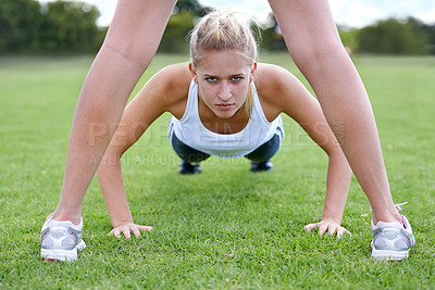 Buy stock photo Women, portrait and push ups on field for fitness with exercise, training and workout on grass for sport. Athlete, person and confidence on ground with physical activity for healthy body and wellness