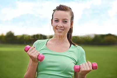 Buy stock photo Happy woman, portrait and dumbbells for weightlifting in fitness, workout or outdoor exercise in nature. Active female person or athlete smile for training, health and wellness on green grass field