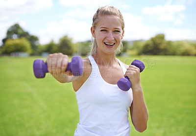 Buy stock photo Woman, portrait and dumbbells, weightlifting for exercise and muscle, athlete outdoor for sport and bodybuilding. Healthy, fitness equipment and strong in park with bodybuilder and workout with smile