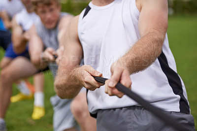 Buy stock photo Rope, arm pull and men hands with teamwork, tug of war and fitness outdoor on sport field. Training, workout and athlete group with support together for competition and strong exercise for health