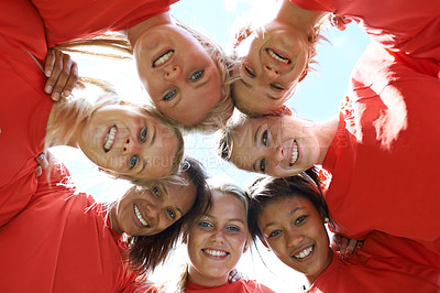 Buy stock photo Team, women and happy with sport huddle for support, celebration or solidarity with blue sky and low angle. Collaboration, athlete and people with smile in circle for fitness, exercise or competition