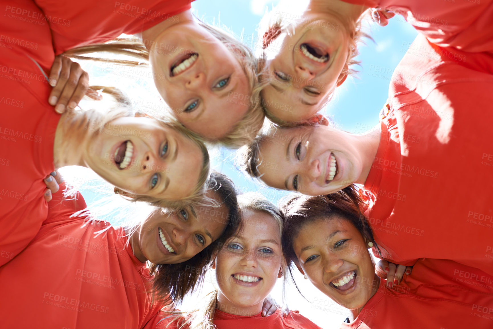 Buy stock photo Team, women and smile with sport huddle for support, celebration or solidarity with blue sky and low angle. Collaboration, athlete and people or happy in circle for fitness, exercise and competition