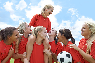 Buy stock photo Sports, success and women soccer team winner celebrating victory, achievement or match goal on field. Football, champion and girl group lifting captain in celebration, competition or training triumph