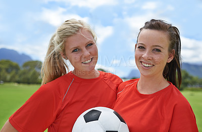 Buy stock photo Happy woman, portrait and friends with soccer ball on green grass for sports, game or outdoor match. Female person or football players smile for fitness, training or practice on open field in nature
