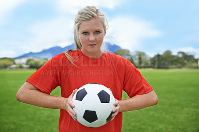 Buy stock photo Happy woman, portrait and soccer ball on green grass for sports match, practice or outdoor game. Female person, athlete or football player smile for playing sport, workout or cardio exercise on field