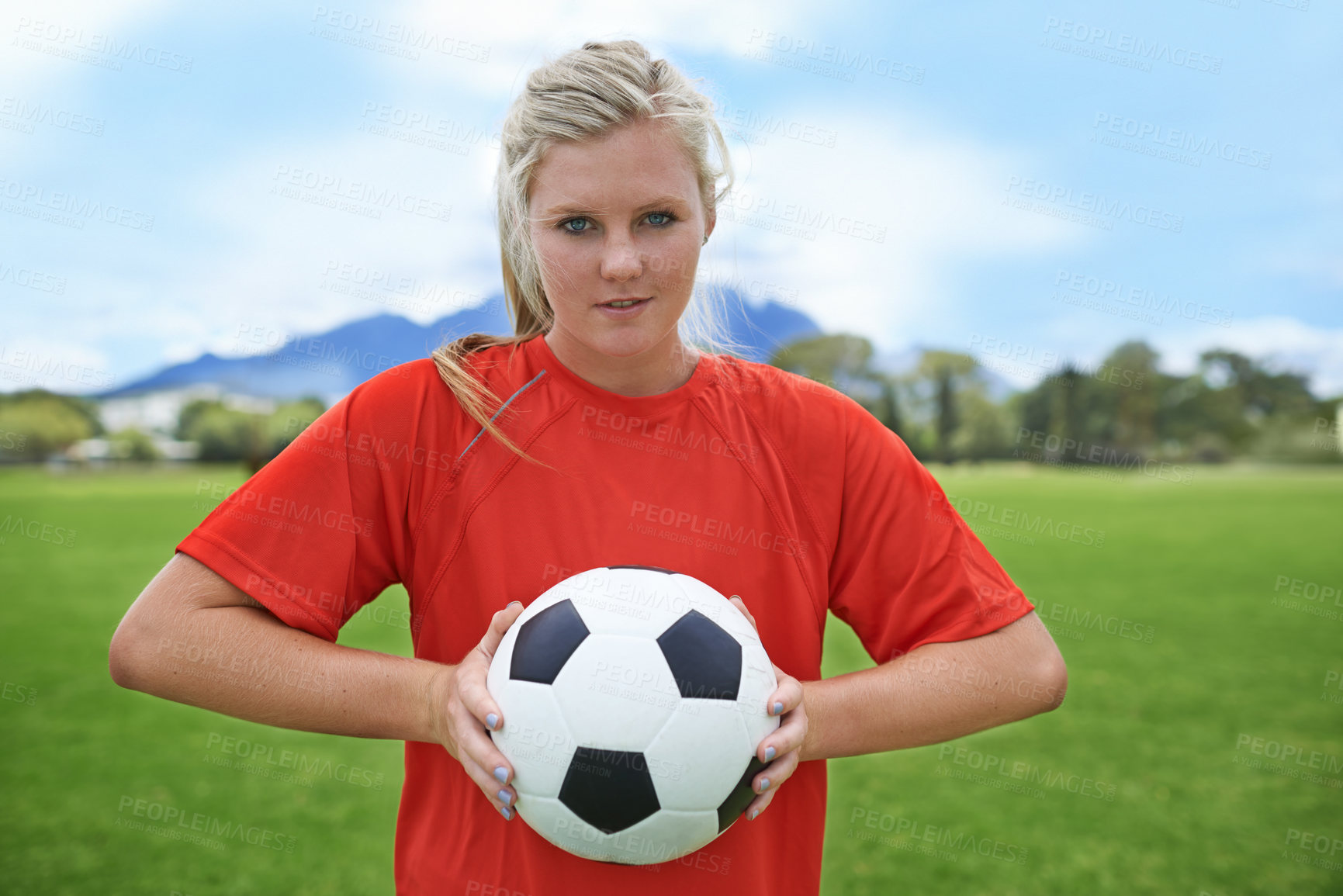 Buy stock photo Happy woman, portrait and soccer ball on green grass for sports match, practice or outdoor game. Female person, athlete or football player smile for playing sport, workout or cardio exercise on field