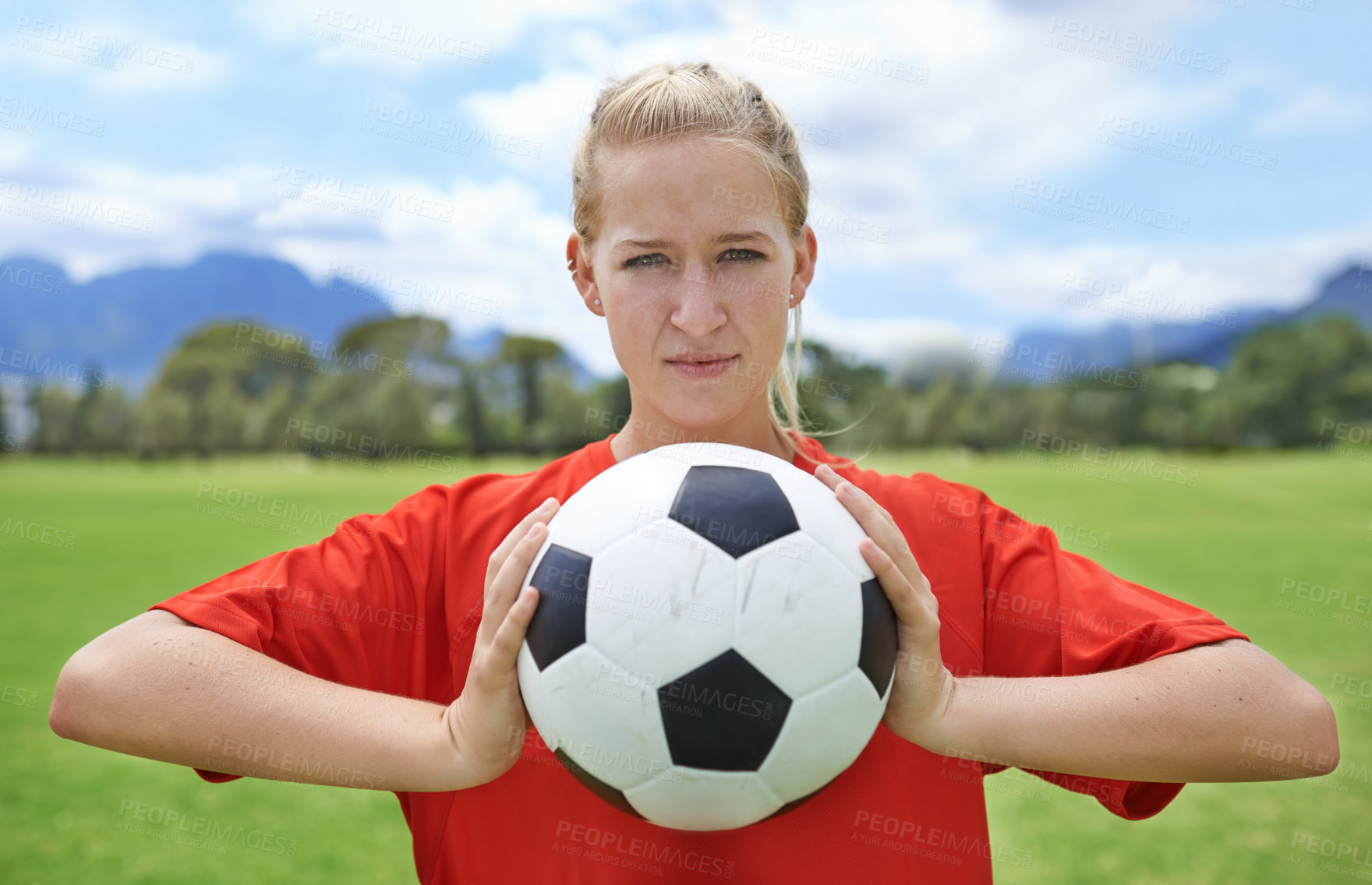 Buy stock photo Portrait of a determined young female soccer player