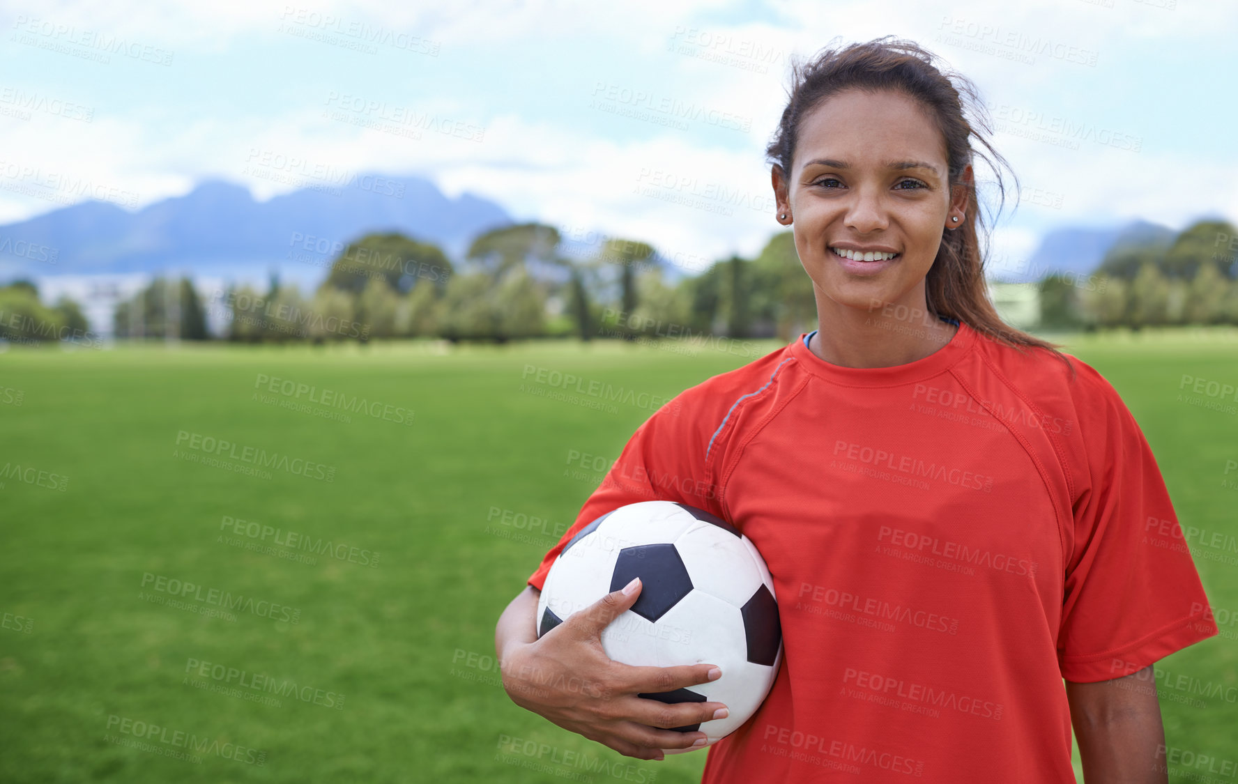 Buy stock photo Girl, football field and portrait with ball, happy and soccer player for match, competition and game. Fitness, practice and ready for training, outdoor and exercise for athlete, fun and sport
