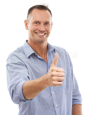 Buy stock photo Thumbs up, studio portrait and man with hand for support, yes or like emoji isolated on a white background. Happy model person with sign or icon for thank you, vote or review for winning motivation