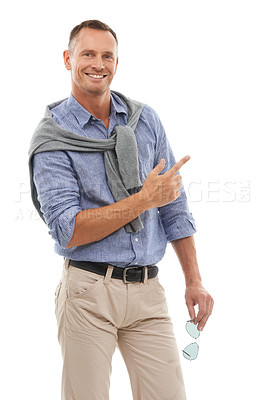 Buy stock photo Man, hand and pointing for product placement standing isolated against a white studio background. Portrait of happy male with smile showing gesture or pointed finger for advertisement on mockup