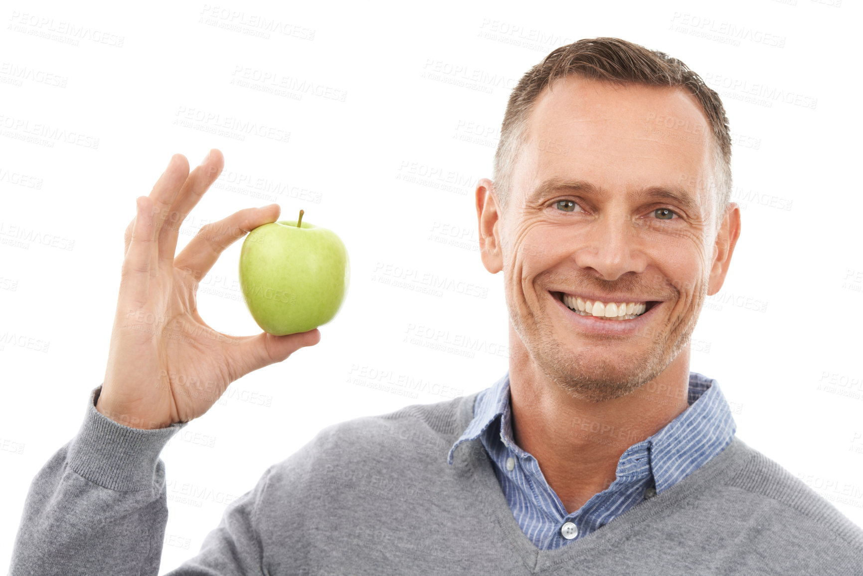 Buy stock photo Man, studio portrait and apple in hands for health, diet and wellness isolated on a white background. Model person with nutrition vegan fruit food for a healthy lifestyle, motivation and clean eating