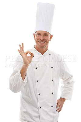 Buy stock photo Portrait of chef, man with ok hand gesture and confident smile, cafe owner isolated on white background. Happy executive cook, uniform tasty emoji for restaurant discount deal or promotion in studio.