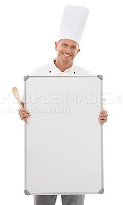 Buy stock photo Chef man, space and board isolated on a white background of empty menu and happy culinary services. Professional, cooking or bakery person with whiteboard mockup for startup ideas in studio portrait