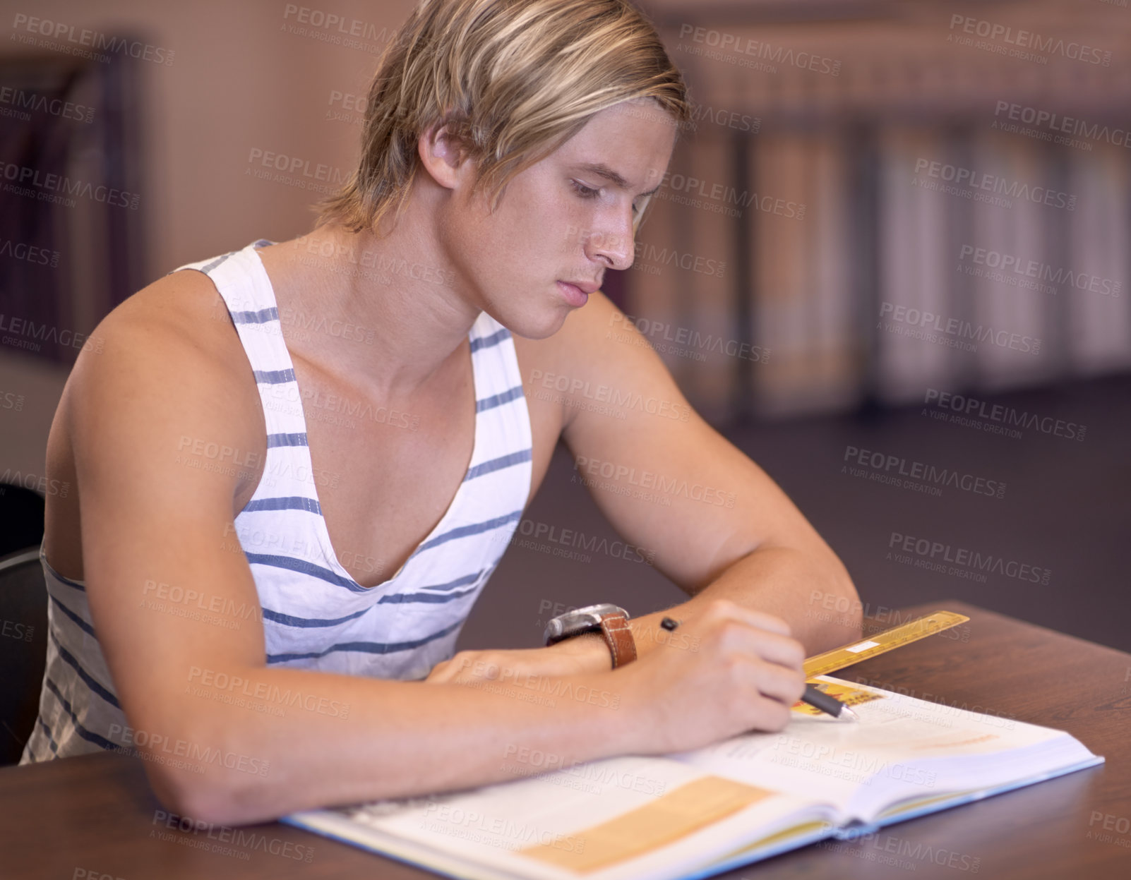 Buy stock photo Education, university and man in library with books for studying, learning and research with knowledge. Writing, college and male student with textbooks for assignment, project and test on campus