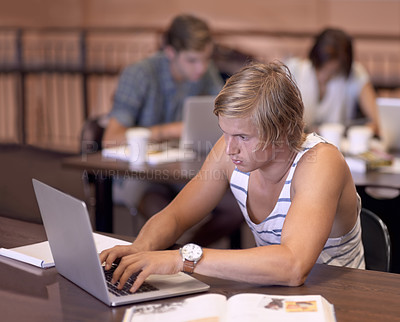 Buy stock photo Education, laptop and man with books for studying, learning and research for knowledge. University, college and student with computer and textbooks for assignment, project and test in campus library