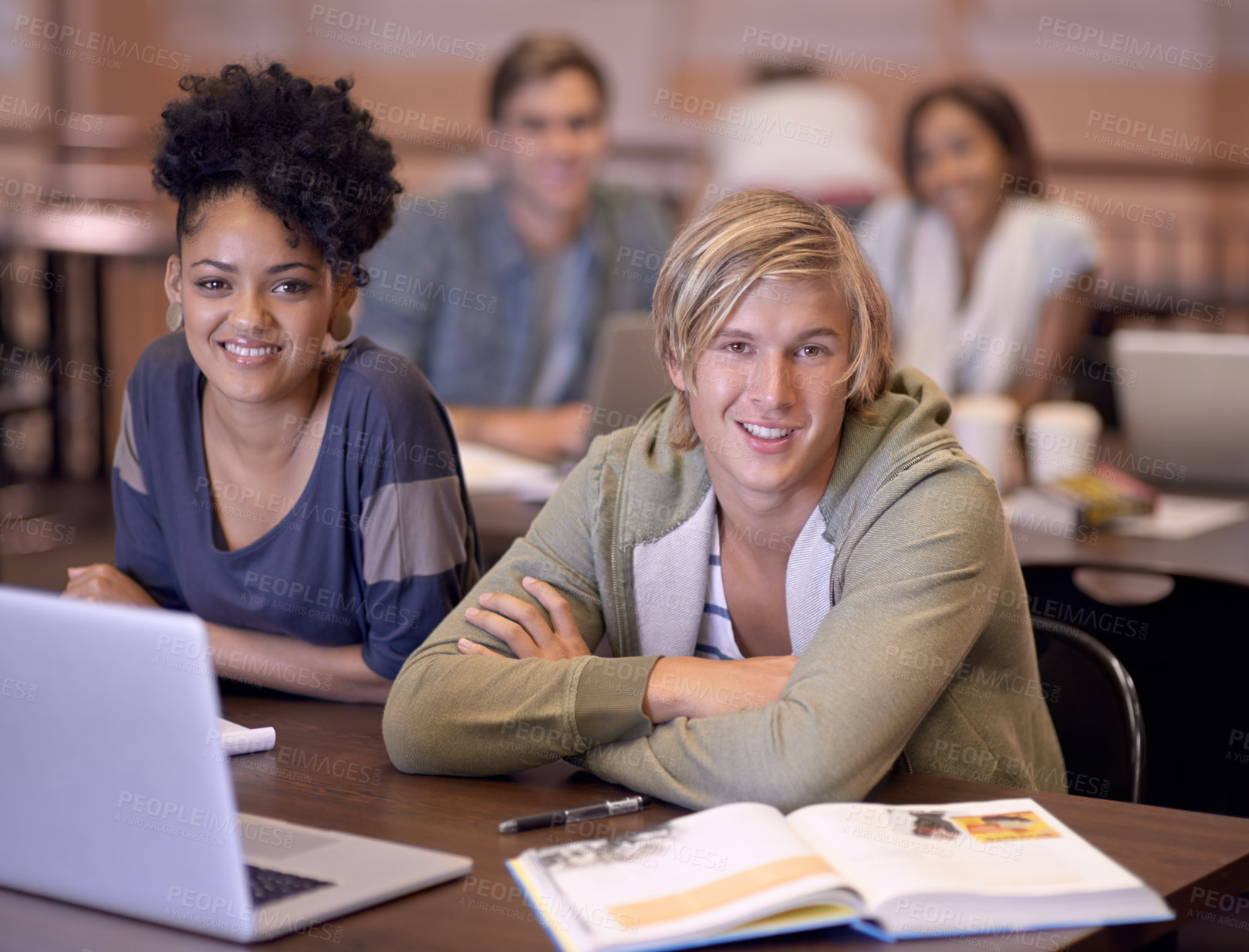 Buy stock photo Portrait of two students researching their assignments together on a laptop