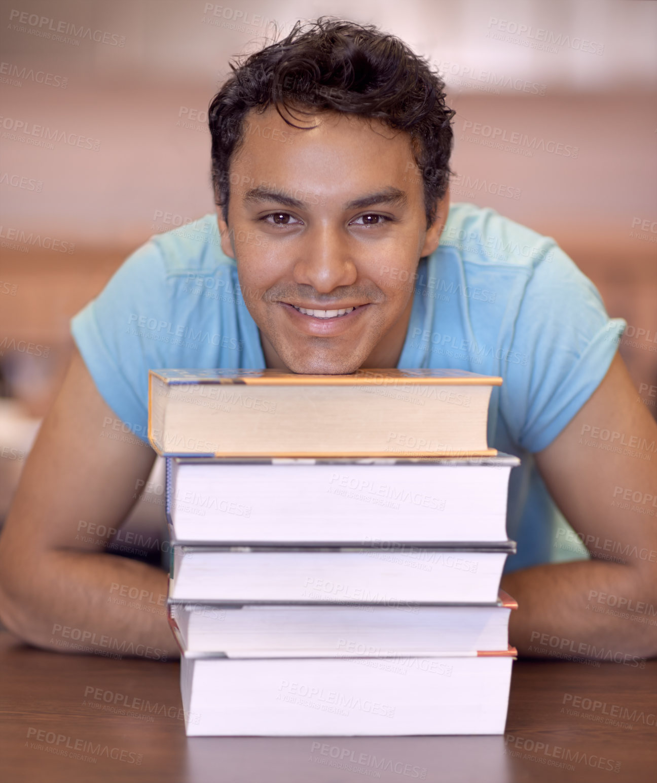 Buy stock photo Student man, portrait and stack of books for education, development and happy at college library. Person, learning and knowledge with smile, pride and research for assessment at university campus