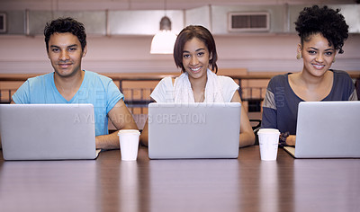 Buy stock photo University, laptop and portrait of students in library for online research, studying and learning. Education, college and men and women on computer for internet, assignment and website for knowledge
