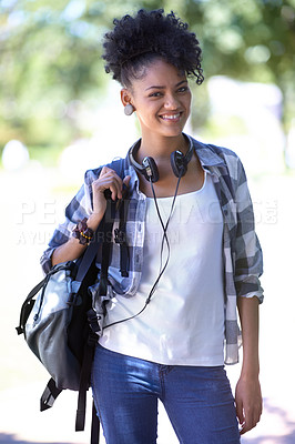 Buy stock photo Woman, portrait and backpack as student or headphones for academic study, education or learn. Female person, face and smile at academy campus or outdoor nature for university relax, college or summer