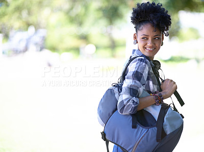 Buy stock photo An attractive young college student standing outdoors