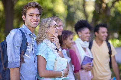 Buy stock photo A group of students standing in a line on campus
