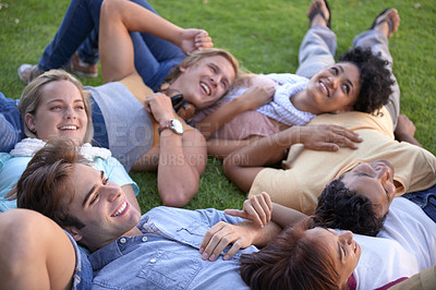 Buy stock photo Relax, friends and happy group on grass at park on vacation, holiday or summer. People, smile and team of students on lawn at garden, circle in nature or freedom of young community together outdoor