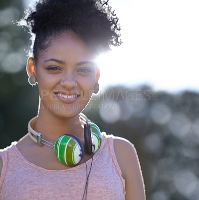 Buy stock photo Portrait, student or happy woman at park with headphones at university campus outdoor in nature. Face, college and smile of girl or young person in education for learning to study at school in Brazil