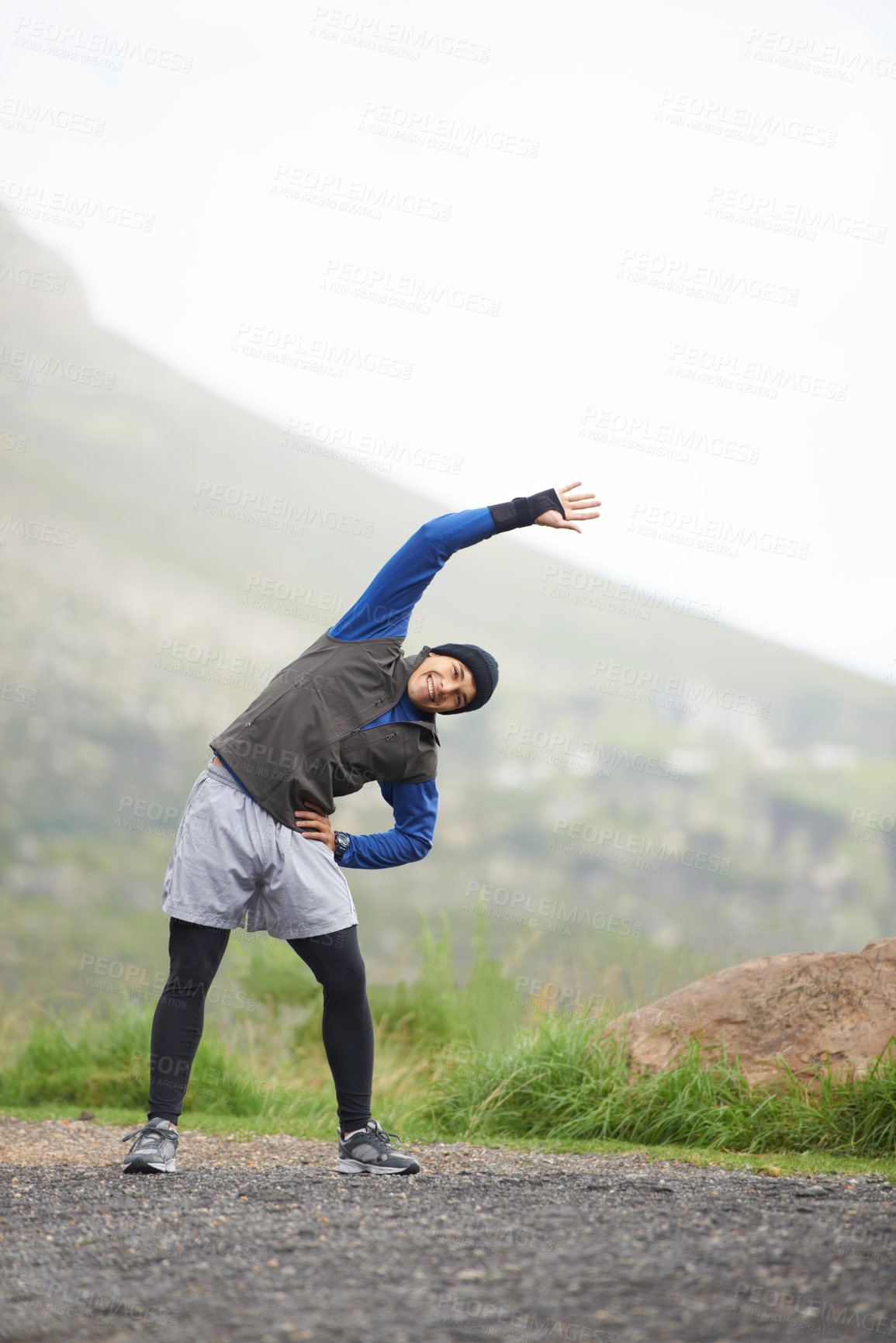 Buy stock photo Man, stretching and prepare for fitness outdoor, mountain and nature with runner and start exercise. Workout, training and warm up in road, ready for race or cardio with endurance for health