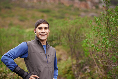 Buy stock photo Earphones, runner or portrait of a happy man in forest for workout, exercise or fitness training in woods. Nature, confident sports person or healthy athlete with radio music audio, wellness or smile