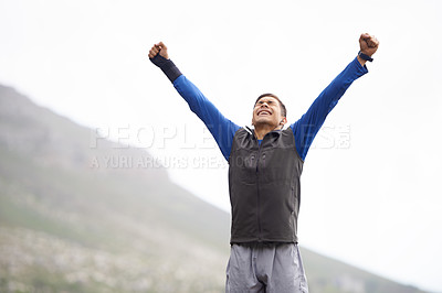 Buy stock photo Man, hiker and winner on mountain peak and happy with progress, exercise and victory. Hiking, fitness and climber for training, achievement and nature to explore, success and health in outdoors