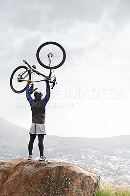 Buy stock photo Back, success and a man with a bike on the mountains for training achievement or pride. Nature, fitness and a male biker on a cliff or hill with a bicycle for an exercise, fitness or competition win