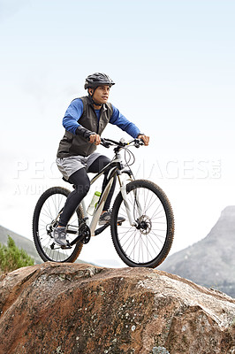 Buy stock photo Sports, athlete and a man on a bike on the mountain for cycling, training and travel in nature. Idea, health and a male cyclist on a hill with a bicycle for riding, exercise and an outdoor workout