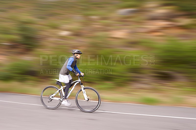 Buy stock photo Man, mountain bike and cycling on road in speed for nature adventure or outdoor extreme sports. Male person or cyclist on bicycle for cardio, street or downhill in motion blur, exercise or practice