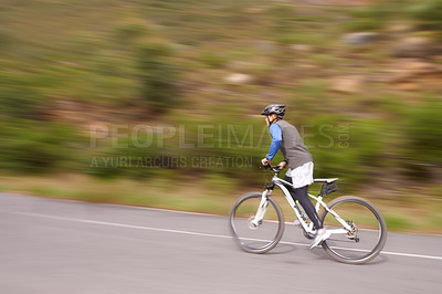 Buy stock photo Man, mountain bike and cycling on road for nature adventure, speed or outdoor extreme sports. Male person or cyclist on bicycle for fast cardio, street or uphill in exercise, practice or training