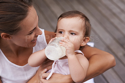 Buy stock photo Cropped shot of a little baby girl with her mother