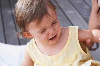 Buy stock photo Baby, girl and unhappy or crying outside on porch, sad and upset for mistake or fail in childhood. Kid, toddler and frustration and distress for info, autism and overstimulation or adhd in outdoors