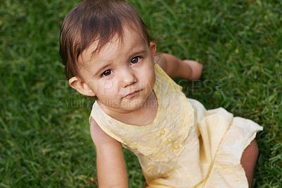 Buy stock photo Cute, grass and portrait of girl baby having fun and playing in backyard, park or garden. Nature, sweet and kid, infant or toddler sitting on the lawn for child development senses outdoor at home.