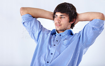 Buy stock photo Happy man, relax and sitting back at office on break for done, completion or finished on a white studio background. Face of young handsome male person or employee in rest with blue t shirt on mockup