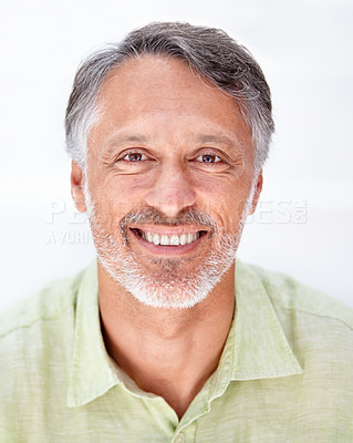 Buy stock photo Portrait, mature man and happy in studio for old age retirement and wellness with wrinkles on break. Person, face and senior guy with pride with grey beard, positive and relax by white background