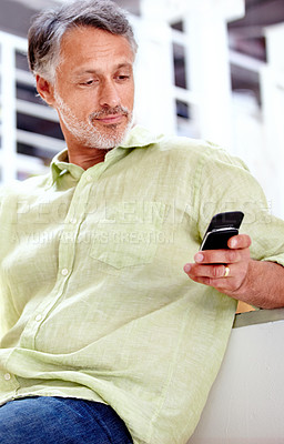 Buy stock photo Relax, couch or mature man with phone for social media, message or news update with notification. Technology, chat or senior entrepreneur with mobile app for networking, communication or texting