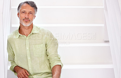 Buy stock photo Portrait, mature man and positive on stairs in confidence in career and mockup in studio. Person, happy face and senior entrepreneur with relax in start up company and enterprise by white staircase