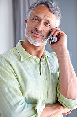 Buy stock photo Mature, portrait or man on a phone call listening or talking for communication with smile to relax. Happy, retirement or senior person in home calling to chat in conversation or speaking on mobile