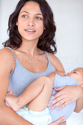 Buy stock photo Mom holding baby in home for sleep, bonding and child care with support in morning. Happy woman, toddler boy and bedtime together in apartment with development, fatigue and safety with mothers love.