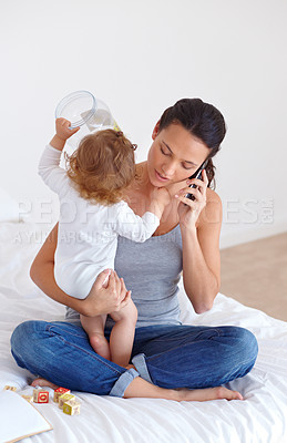 Buy stock photo Phone call, playing and mother with baby on bed for communication and bonding together at modern house. Discussion, fun and young mom on mobile conversation and holding toddler in bedroom at home.