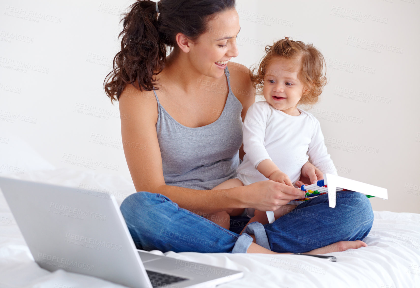 Buy stock photo Learning, baby and happy mother on laptop in bedroom for online education or remote work at home. Freelancer mom, computer and kid in bed playing with abacus, care and toddler together with family