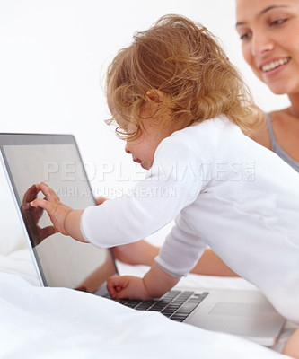 Buy stock photo Baby, learning and mom with laptop in home with cartoon, movies or games for education. Infant, kid and mother with computer in bedroom for child development, growth and website for teaching