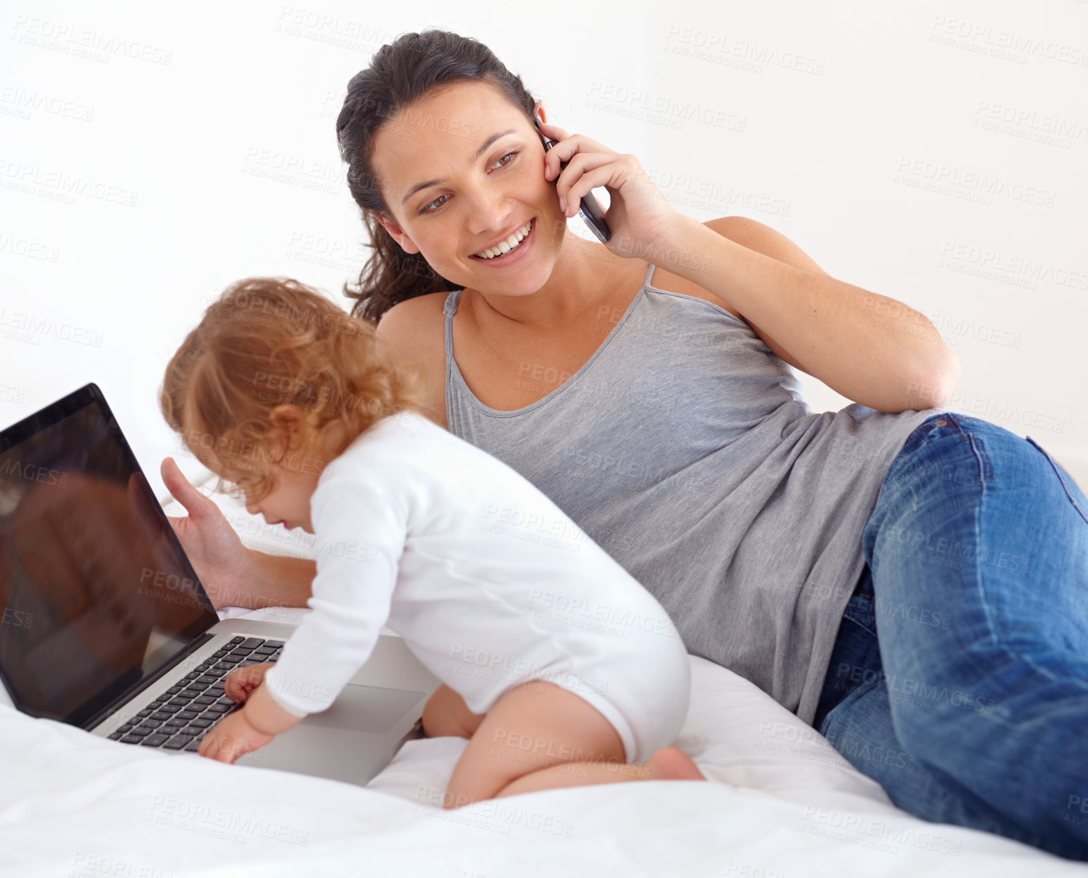 Buy stock photo Working, phone call and mom with baby on laptop multitasking in home. Infant, kid and mother busy with computer and smartphone for remote work, productivity and online communication in bedroom