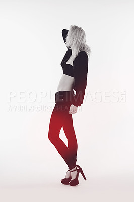 Buy stock photo Sexy, fashion and punk with woman in studio for edgy, glamour and beauty. Creative, aesthetic and rocker trendy with female model isolated on background for monochrome, black and white style