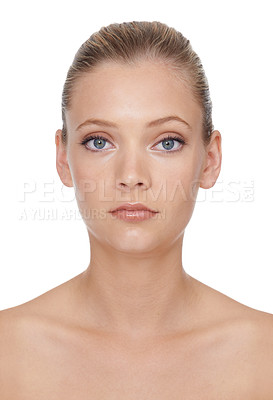 Buy stock photo Woman, portrait or beauty with cosmetics in studio for glowing face, wellness and dermatology or serious. Model, person or confidence with skincare, collagen or makeup on white background and topless